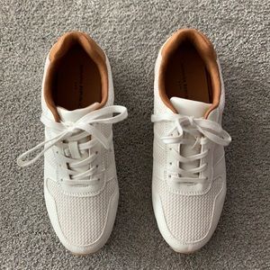 Women’s white and tan sneakers